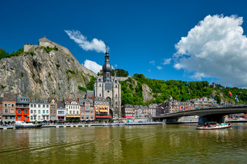View of picturesque Dinant town, Dinant Citadel and Collegiate Church of Notre Dame de Dinant over the Meuse river. Belgian province of Namur, Blegium