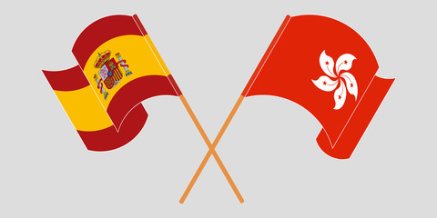 Crossed and waving flags of Hong Kong and Spain