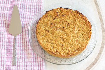 Homemade Roasted vegetable quiche pie Delicious vegetarian food. freshly baked
Onions carrots squash courgettes KUGEL