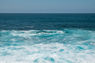 Fototapeta na wymiar Strong waves in the ocean, Puerto de la Cruz, Tenerife, Spain