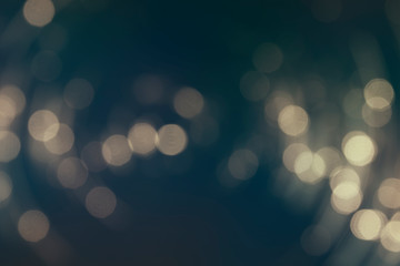 Bokeh light background.  Holiday glowing backdrop. Defocused Background With Blinking Stars. Blurred Bokeh.