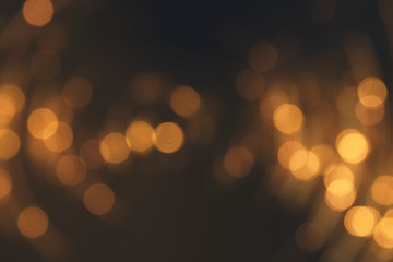 Fototapeta premium Bokeh light background. Holiday glowing backdrop. Defocused Background With Blinking Stars. Blurred Bokeh.