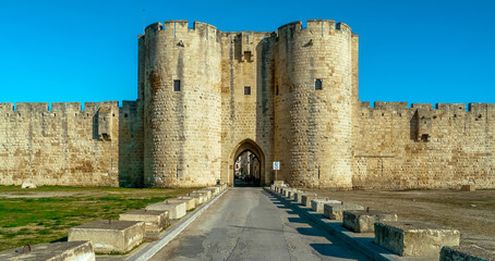 Aigues-Mortes, Gard / France - December 2010: One of the gates in the medieval city wall
