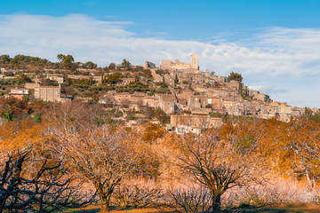 Fototapeta na wymiar Lacoste, Provence / France - December 2010: General view of the village on a hilltop