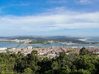 Fototapeta na wymiar The view from the top of the Santa Luzia hill. Aerial view of Viana do Castelo and Limia River in Northern Portugal.