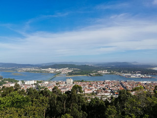 Fototapeta na wymiar The view from the top of the Santa Luzia hill. Aerial view of Viana do Castelo and Limia River in Northern Portugal.