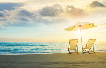 Background with couple of deck chairs at sunset, Travel concept, Summer background
