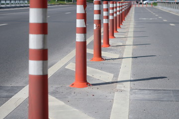 Red and white traffic bollards