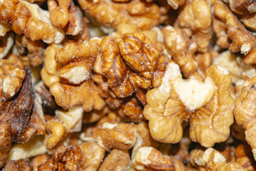 Peeled walnuts close-up. Surface texture. Healthy diet.