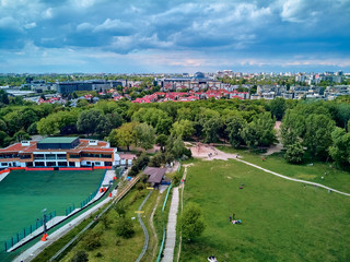 Fototapeta premium A beautiful panoramic view of the sunset in a fabulous evening on Szczesliwice Park - a former village, currently a housing estate in the Ochota district in Warsaw, Poland