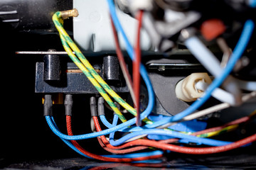 Wires close-up in a household home appliance coffee maker. the concept of home appliances repair