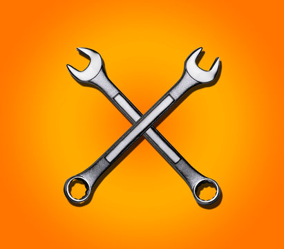 spanners on an orange background