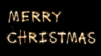 Fototapeta na wymiar Happy New Year and Merry Christmas greeting text written sparkling sparklers isolated on black background and copy space.