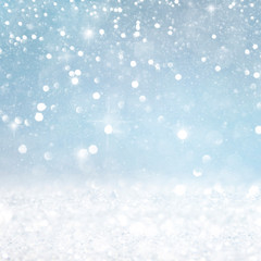 Fototapeta premium Christmas light background. Holiday glowing backdrop. Defocused Background With Blinking Stars. Blurred Bokeh.