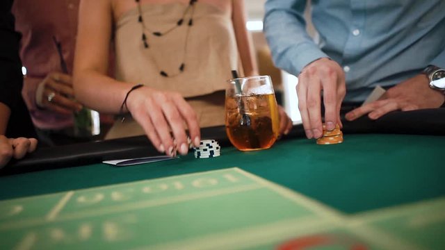 A man and a woman play in a casino