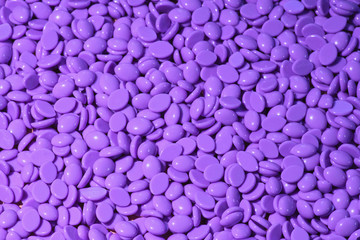 Purple wax granules