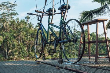 Fototapeta premium Photo of a structure for cycling a tightrope between two mountains