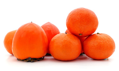 Orange persimmons and mandarin.