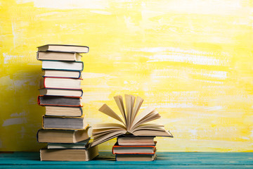 Books on wooden desk table and abstract background. Education background. Copy Space. Back to school.