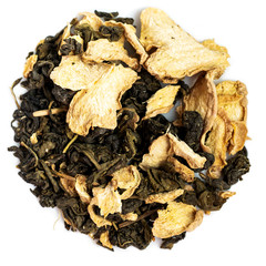 Samples of Herbal loose leaf green tea leaves and dry ginger isolated on white background. Mix of tea leaves isolated on white background.