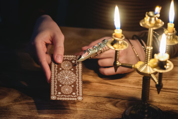Fortune teller is reading a tarot cards concept.