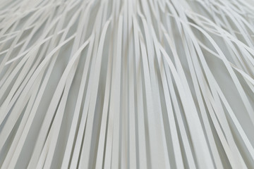 3D rendering of white stripes abstract background on white surface, paper structure