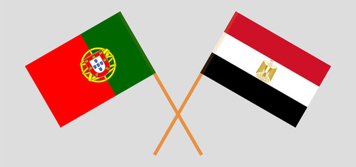 Crossed flags of Egypt and Portugal