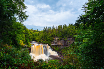 Long exposure image of the Blackwater Falls in Blackwater Falls State Park in West Virginia during the early Autumn