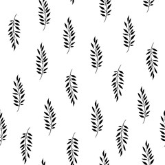 Seamless floral pattern. Stylish repeating texture. Repeating texture with black leaves on background.
