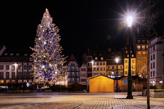 Gigantic Christmas tree in the biggest place of Strasbourg, Kleber place, illuminated during the Christmas season