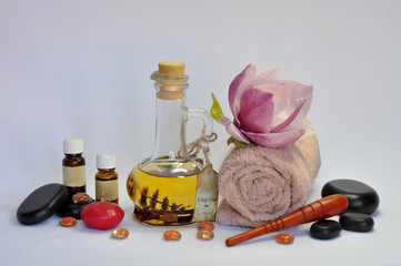 spa still life with essential oils and flowers