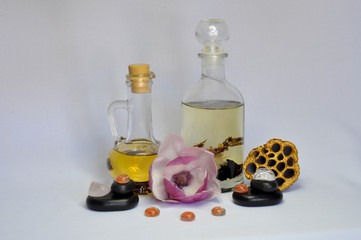 spa still life with essential oils and flowers
