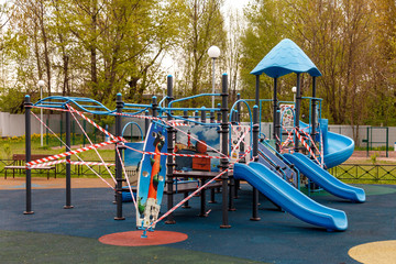 Children's Playground is closed due to pandemic, epidemic. Ban on children's playgrounds. Prevention of covid-19 coronavirus. Fight against virus. Self-isolation mode. Stay at home!