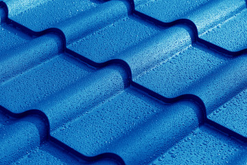 Metallic roof with drops of water.