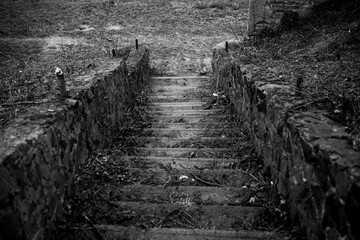 old dilapidated stone stairs leading down