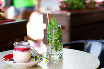 Vanilla Panna Cotta with Jelly of berries in glass jar. Italian dessert panna cotta. Classic...