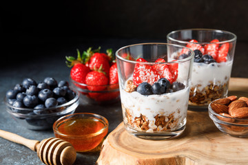Granola parfait with oat cereal, fresh berries and greek yogurt