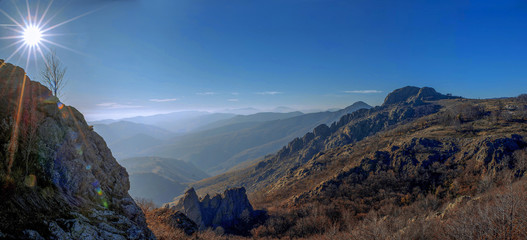 Blanket of fog on a sunny day in a rocky mountain range in Sliven, Bulgaria. "Sinite Kamani" ("Blue Rocks") mountain. 
