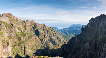 Panorama of the rugged hills in the hiking trail between Pico Ruivo and Pico do Arieiro, Madeira
