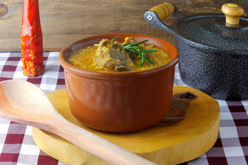 canjiquinha a traditional dish of Brazilian cuisine made with pork ribs and crushed corn, in a...