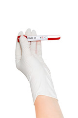 blood test with positive result for Covid-19 in doctors hand