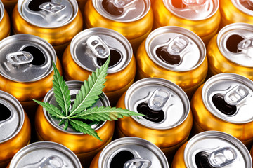 Golden beer cans.The sale of products and drinks with addition of hemp (cannabis) Beer cans with...