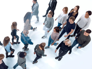 top view . groups of young people walking in different directions