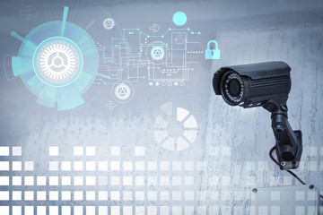 Modern CCTV security camera on white building wall outdoors and digital schema