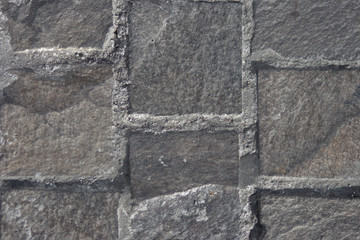 Gray stone texture hard lit by the sun