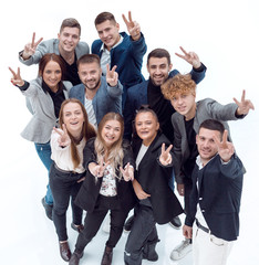 top view. happy business team standing in the new office