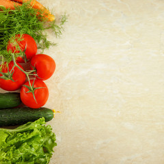 Fresh vegetables tomatoes cucumbers dill salad on a white background.