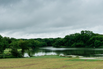 Serene waterfront view in Anna, Texas, on an overcast spring afternoon. Anna is a northern suburb...