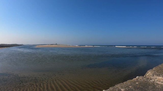 Northern Litoral Natural Park in Esposende, Portugal. The two sides of Restinga de Ofir. One facing the ocean, the other the estuary of C&aacute;vado River. Cavado river mouth.