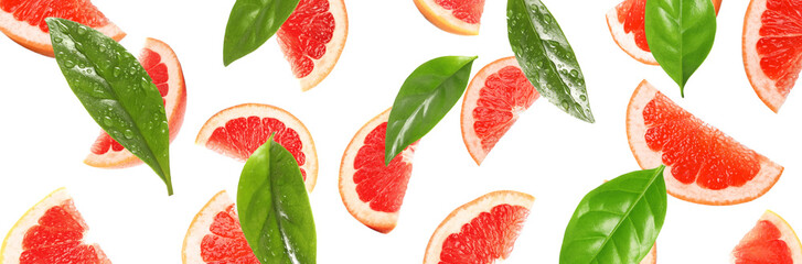 Slices of juicy grapefruit and leaves on white background. Banner design